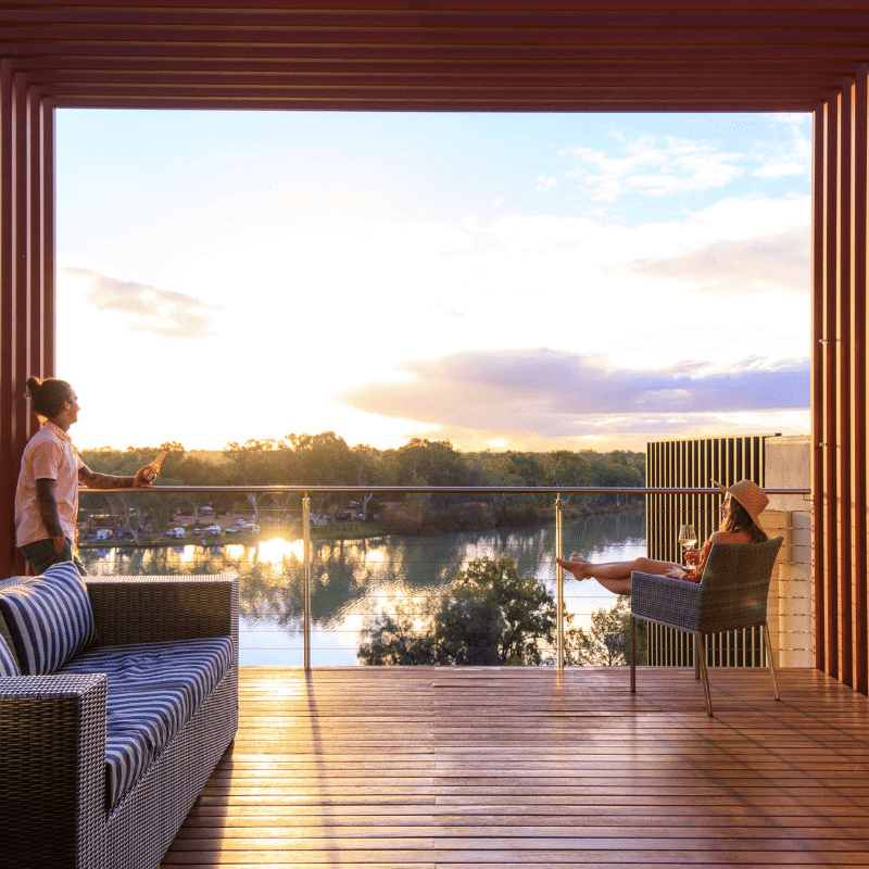 A couple enjoyuing the views of the Murray River from The Frames Retreat